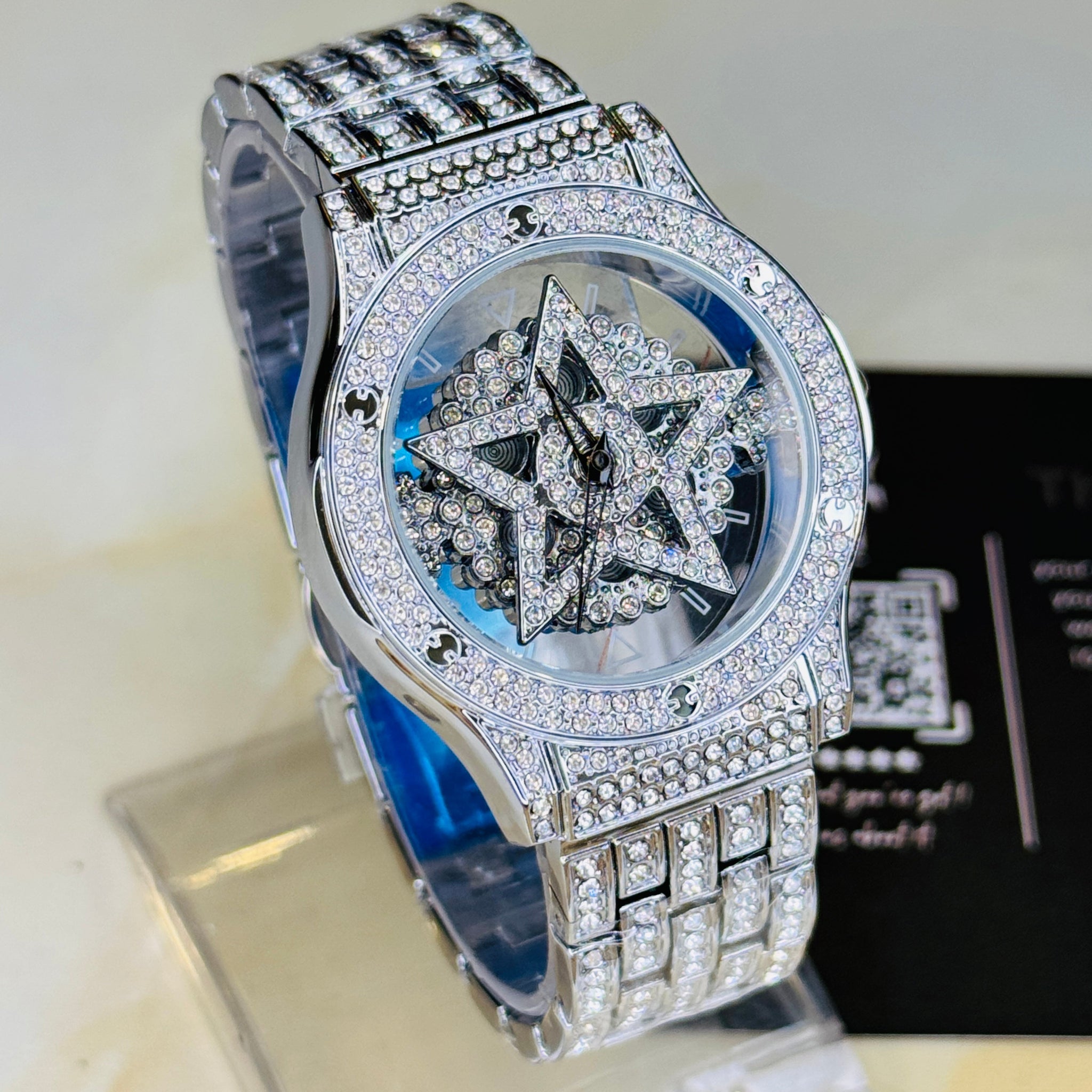 Silver Iced Out Spinner Star Dial Watch