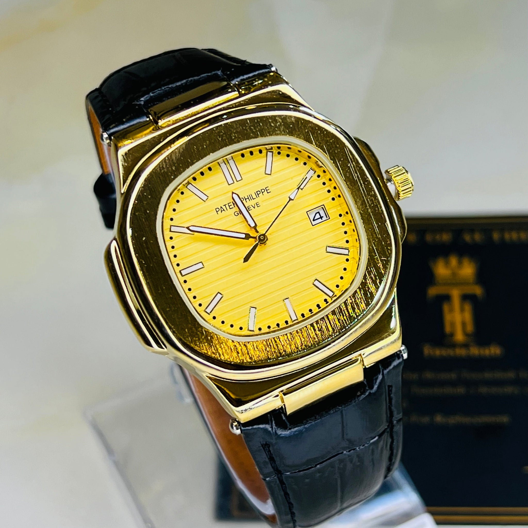 PP Black Leather Strapped Gold Nautilus Watch