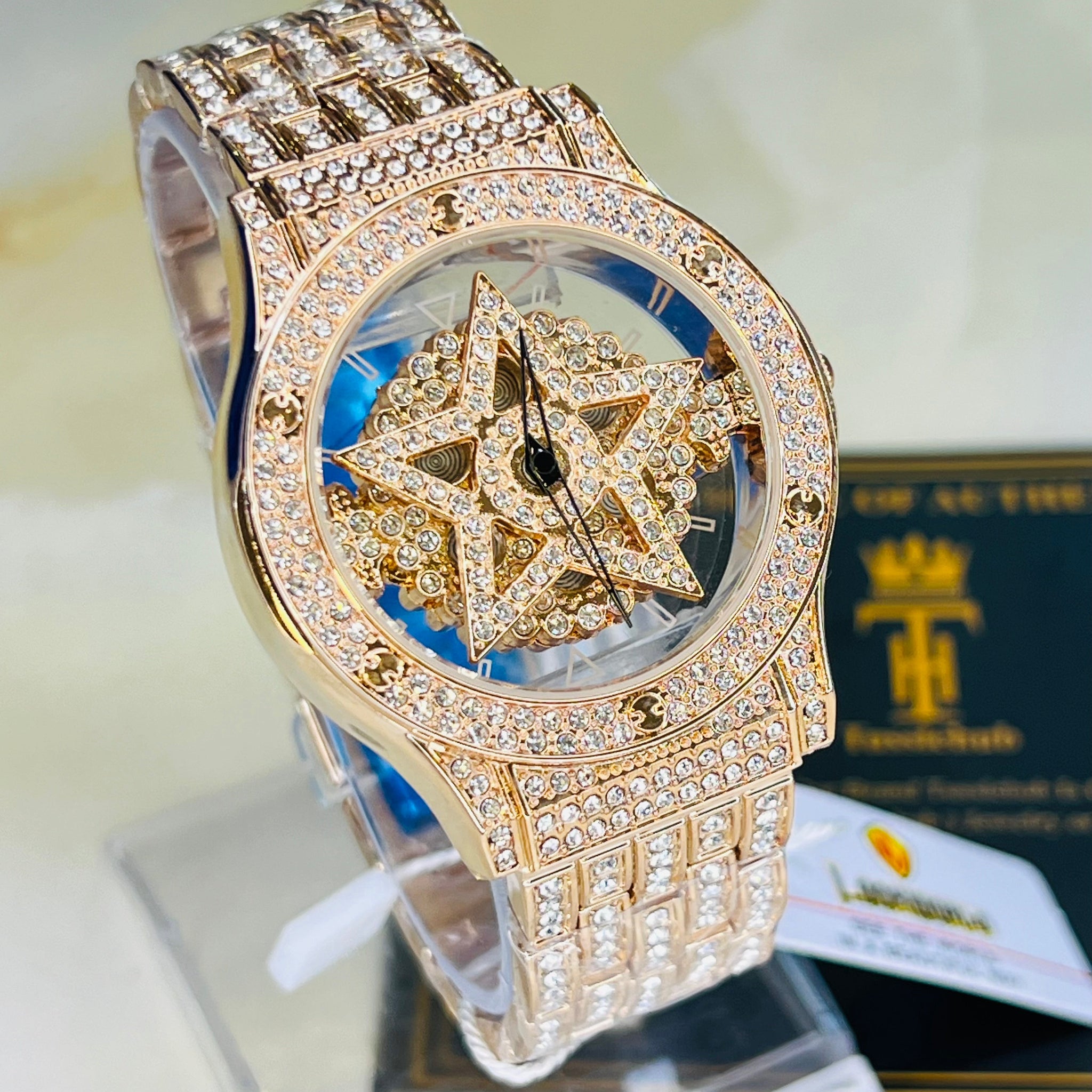 Rose Gold Iced Out Spinner Star Dial Watch