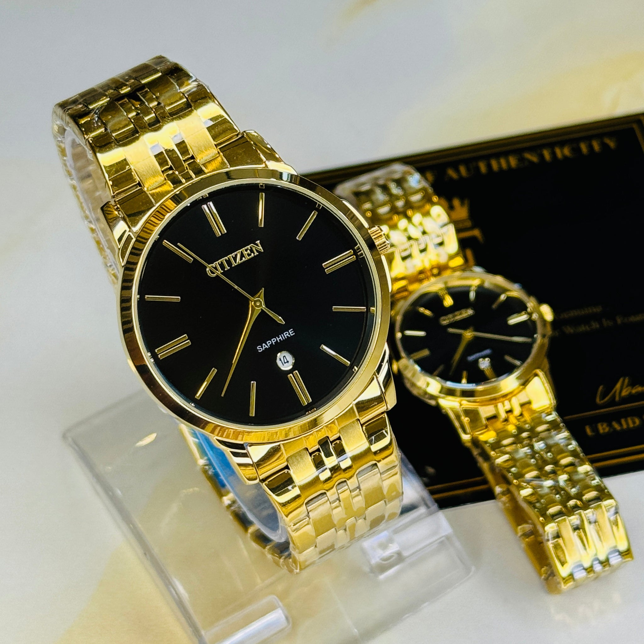 Gold Black Down Date Citizen Couple Watch