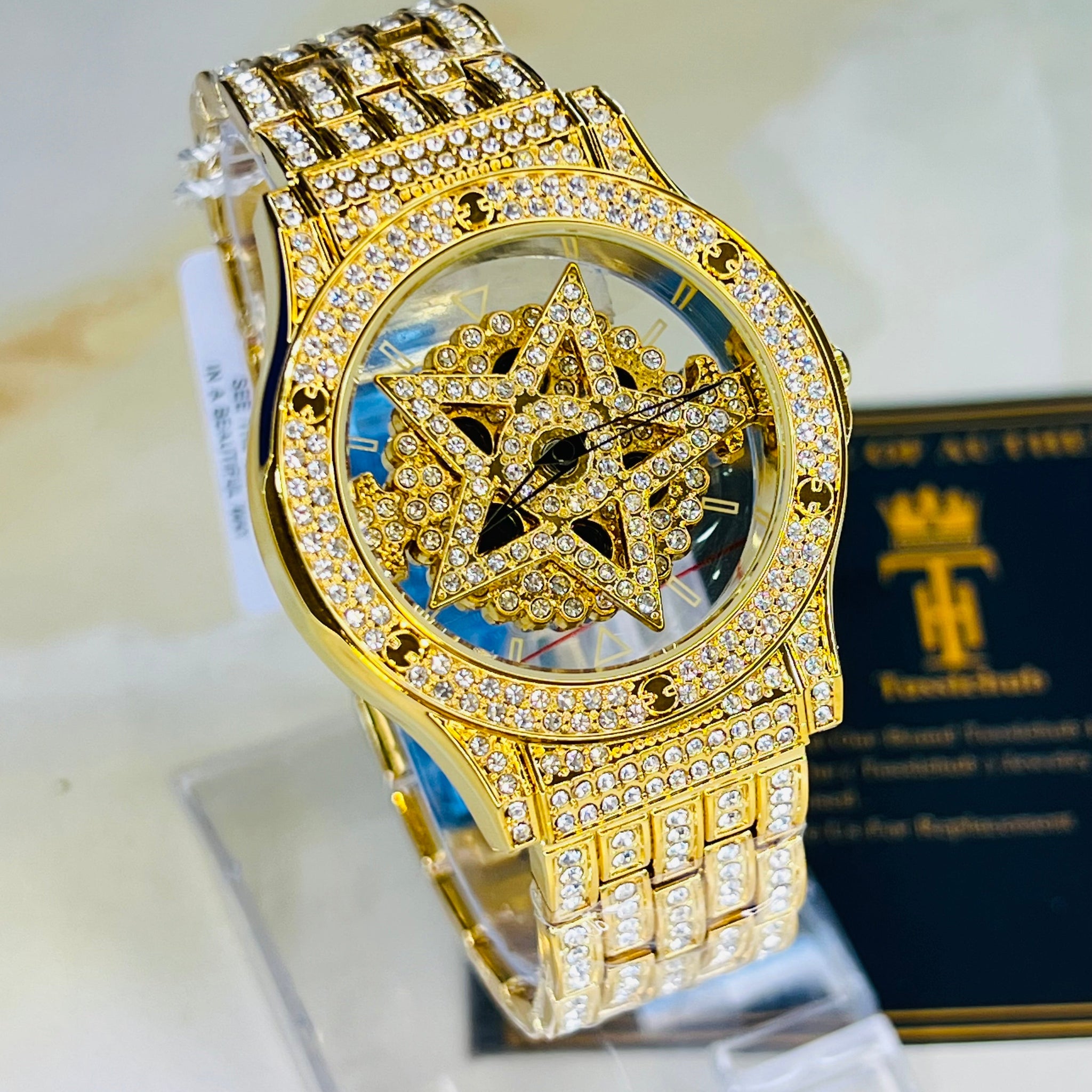 Gold Iced Out Spinner Star Dial Watch